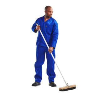 A man wearing a blue cotton conti suit and holding a broom